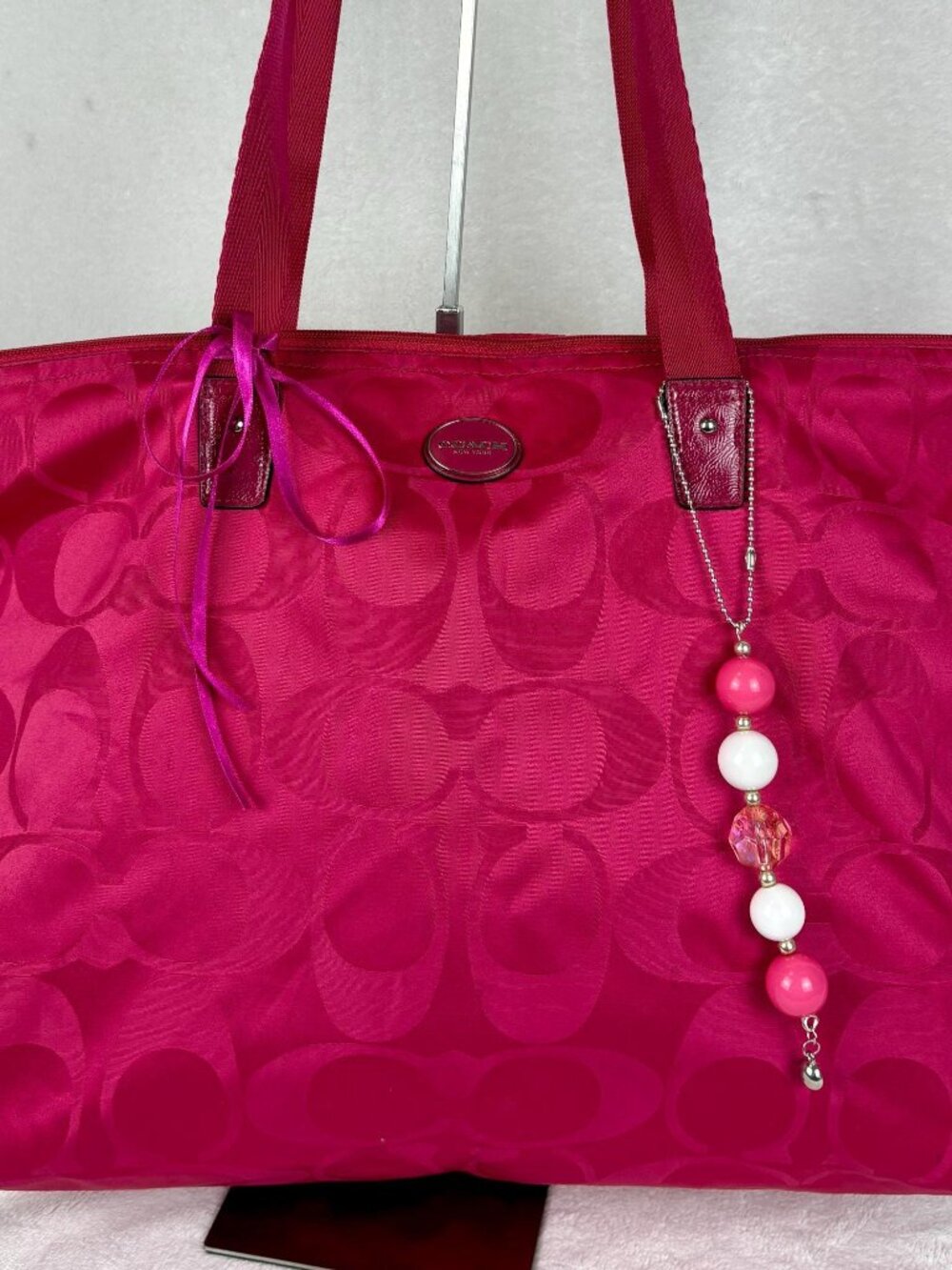 Coach Getaway Signature Monogram Nylon Weekender Tote in Vibrant Fuchsia, Charm